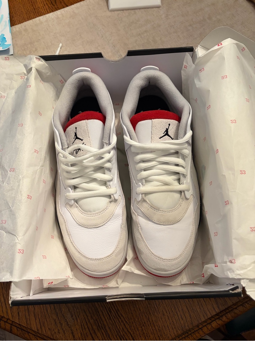 Jordan 4 RM White and Red Low-Top Athletic Sneakers